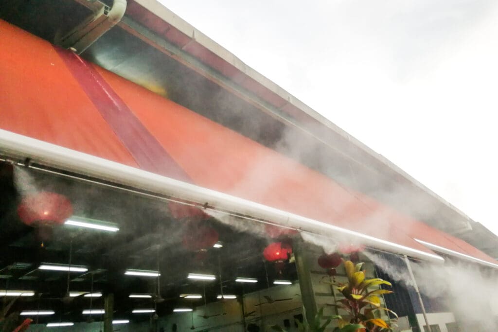 Water mist cooling system lowers ambient temperature