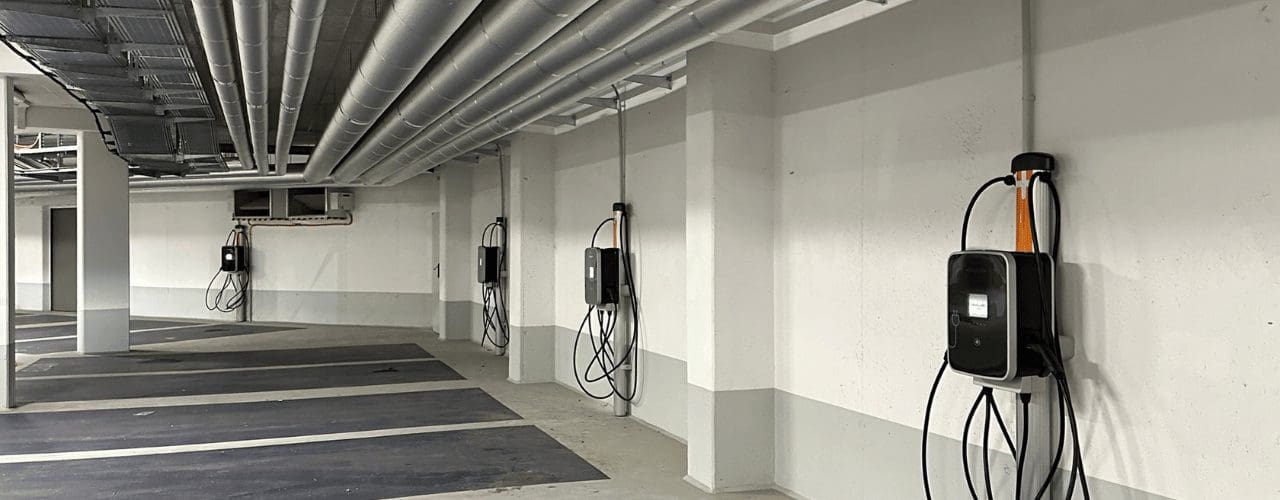 Charging station for electric cars in a residential parking
